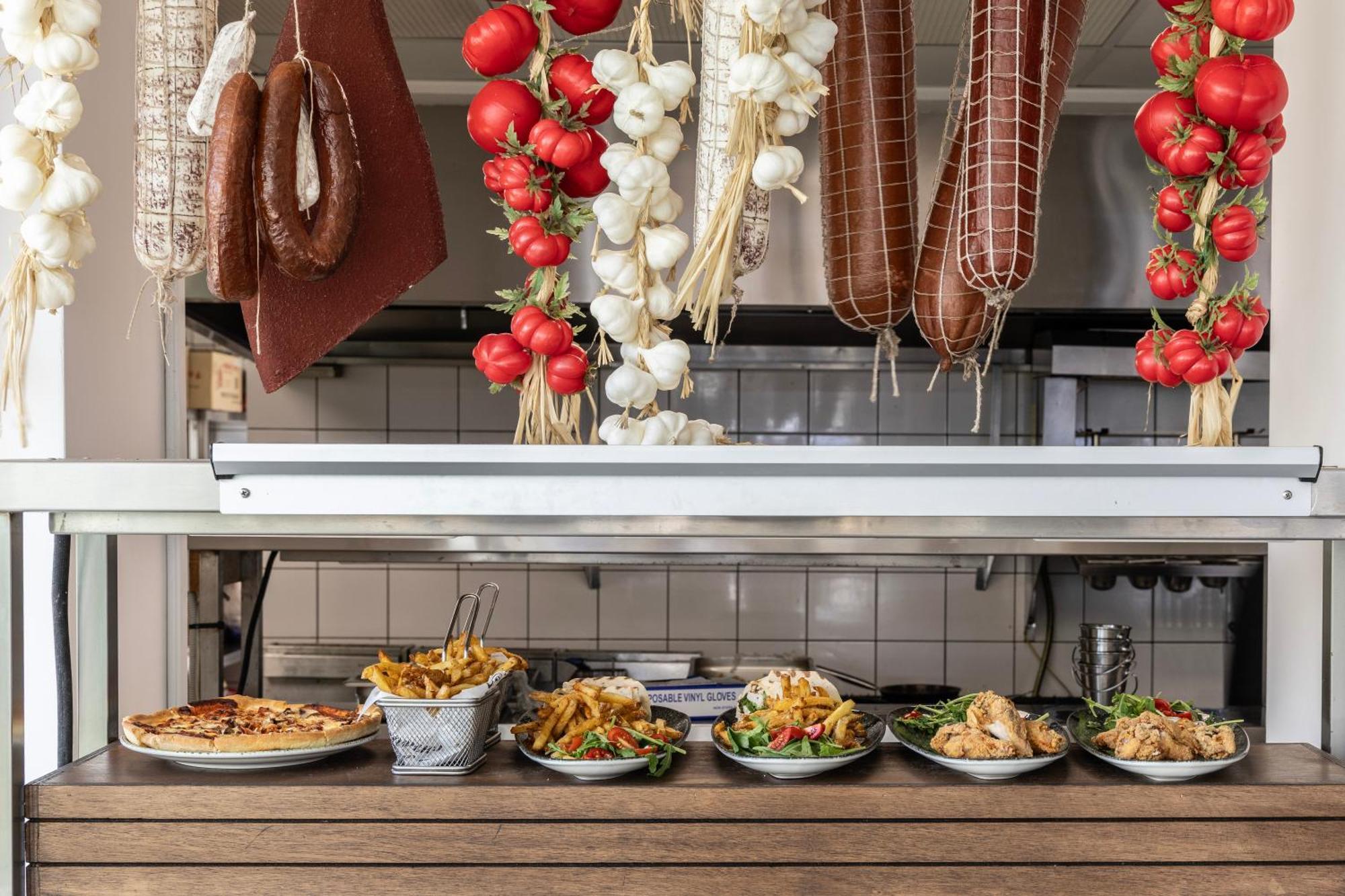 Ivi Mare - Designed For Adults By Louis Hotels Geroskipou Exteriér fotografie A display of prepared tapas at a restaurant in Madrid
